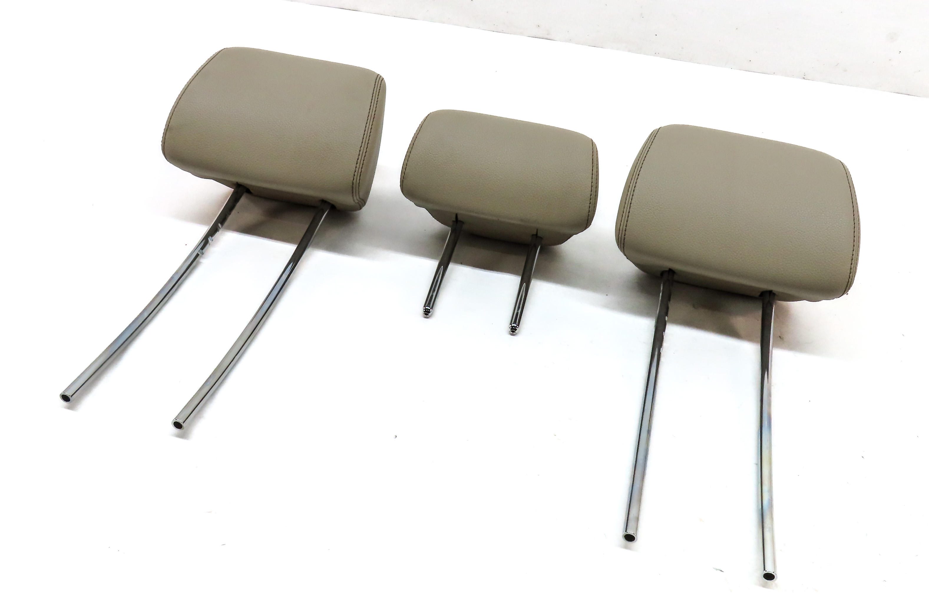 10-16 MERCEDES E CLASS SEDAN (W212) REAR LEFT RIGHT CENTER HEADREST SET3 (BEIGE) — exact item pictured